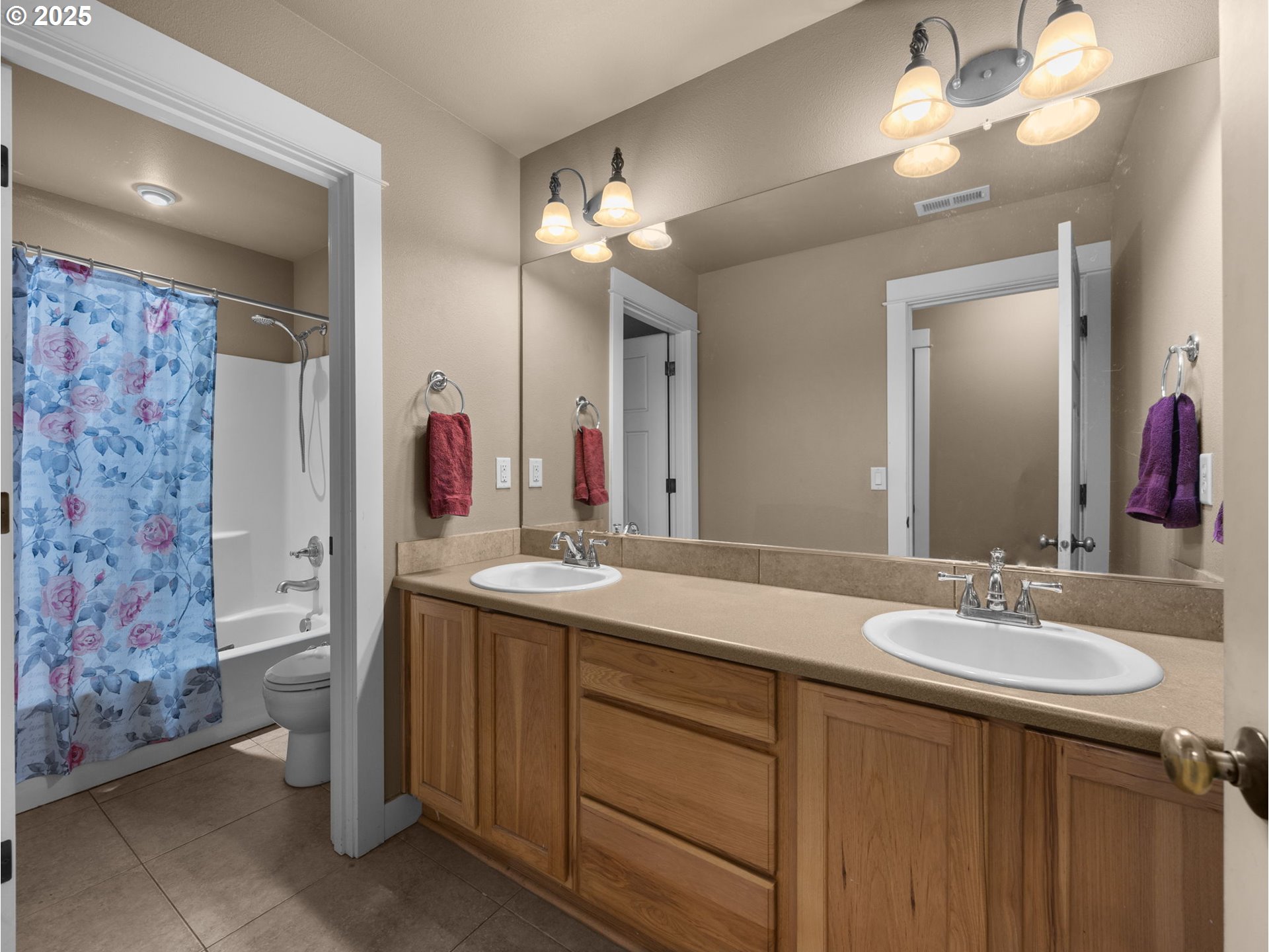 18653 Van Fleet Avenue Sandy, OR 97055 - Photo 39 of 48 a bathroom with a double vanity sink and a mirror