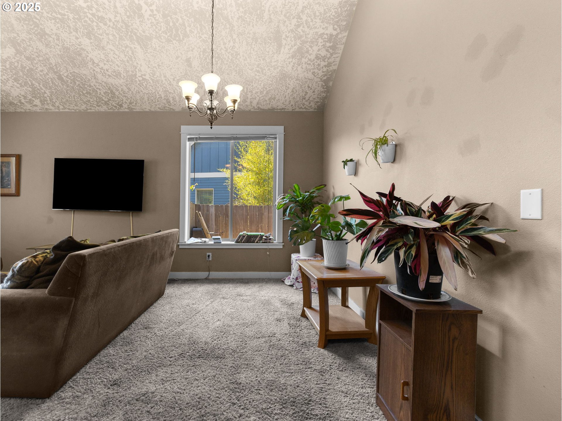 18653 Van Fleet Avenue Sandy, OR 97055 - Photo 8 of 48 a living room with furniture and a flat screen tv