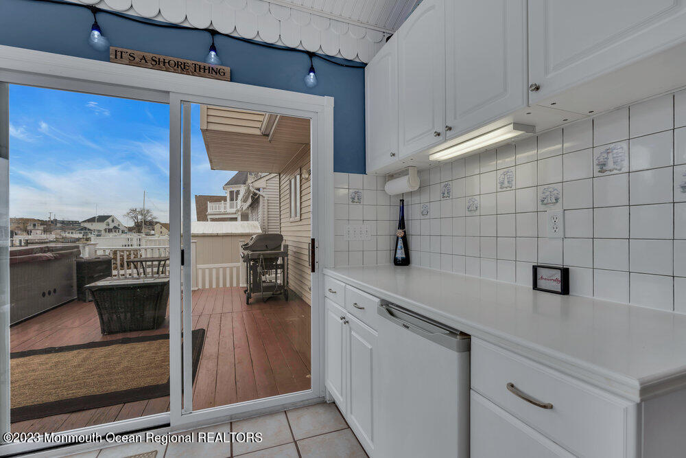 53 Club House Road Brick, NJ 08723 - Photo 20 of 55 a kitchen with a sink and cabinets