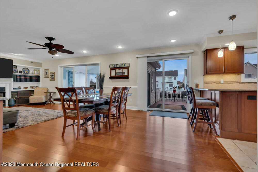 53 Club House Road Brick, NJ 08723 - Photo 8 of 55 a view of a dining room with furniture window and wooden floor