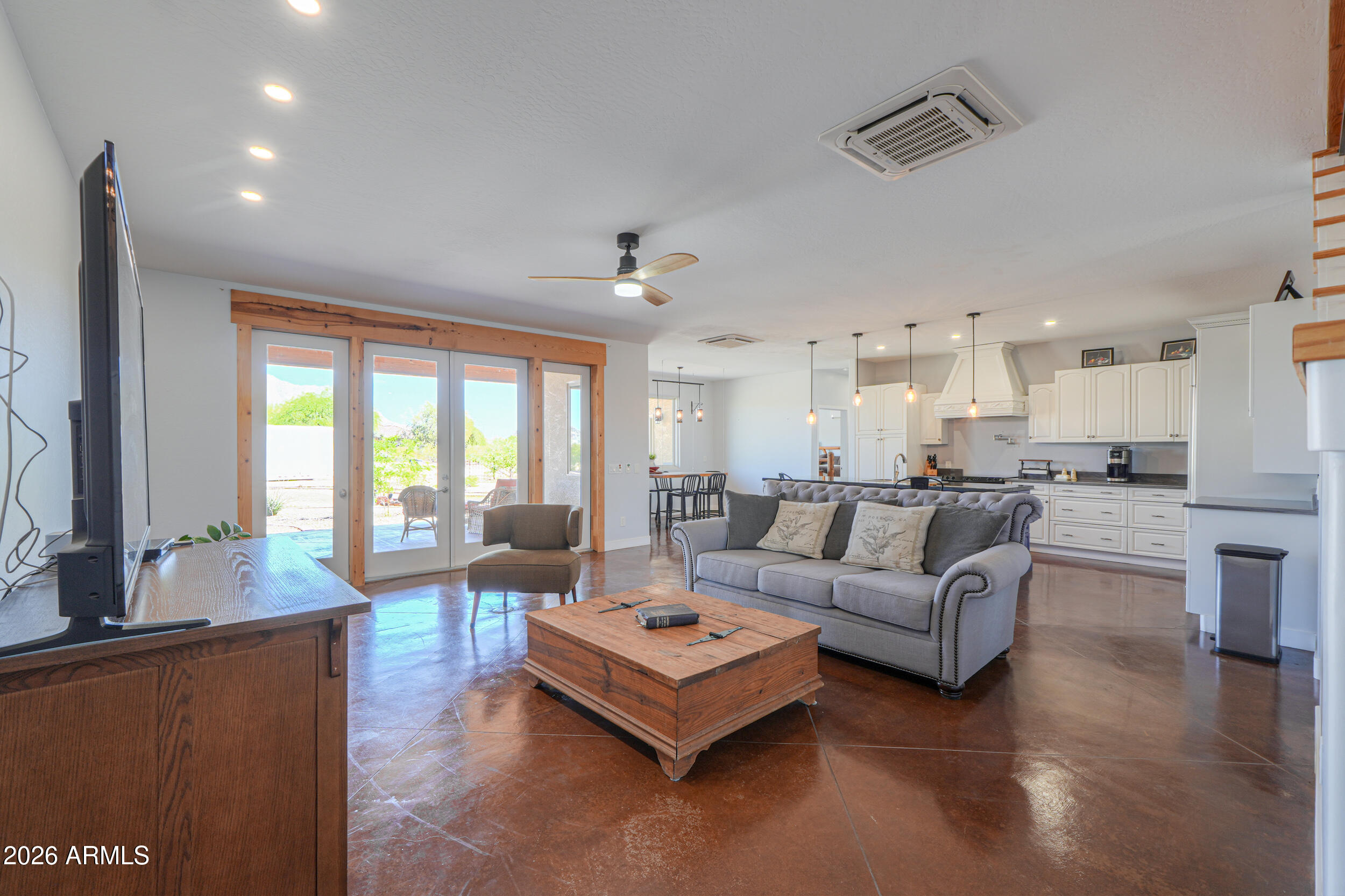 11422 North Hazeldine Road Casa Grande, AZ 85194 - Photo 11 of 59 a living room with furniture and a large window