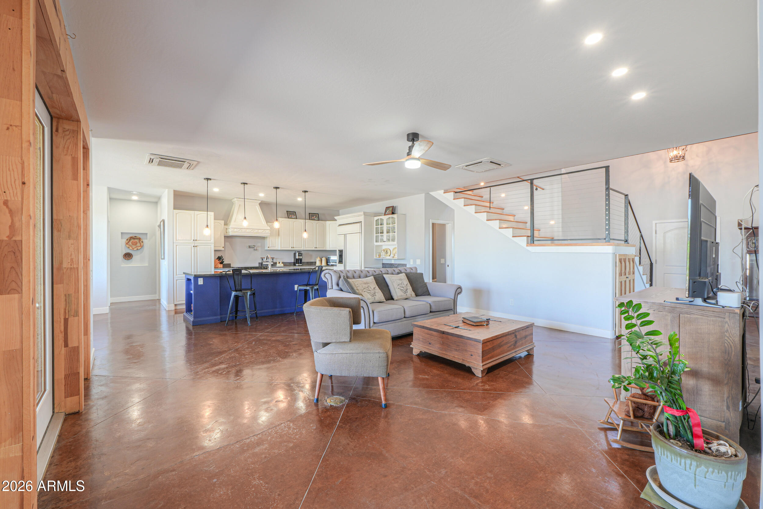 11422 North Hazeldine Road Casa Grande, AZ 85194 - Photo 12 of 59 a living room with furniture and a potted plant