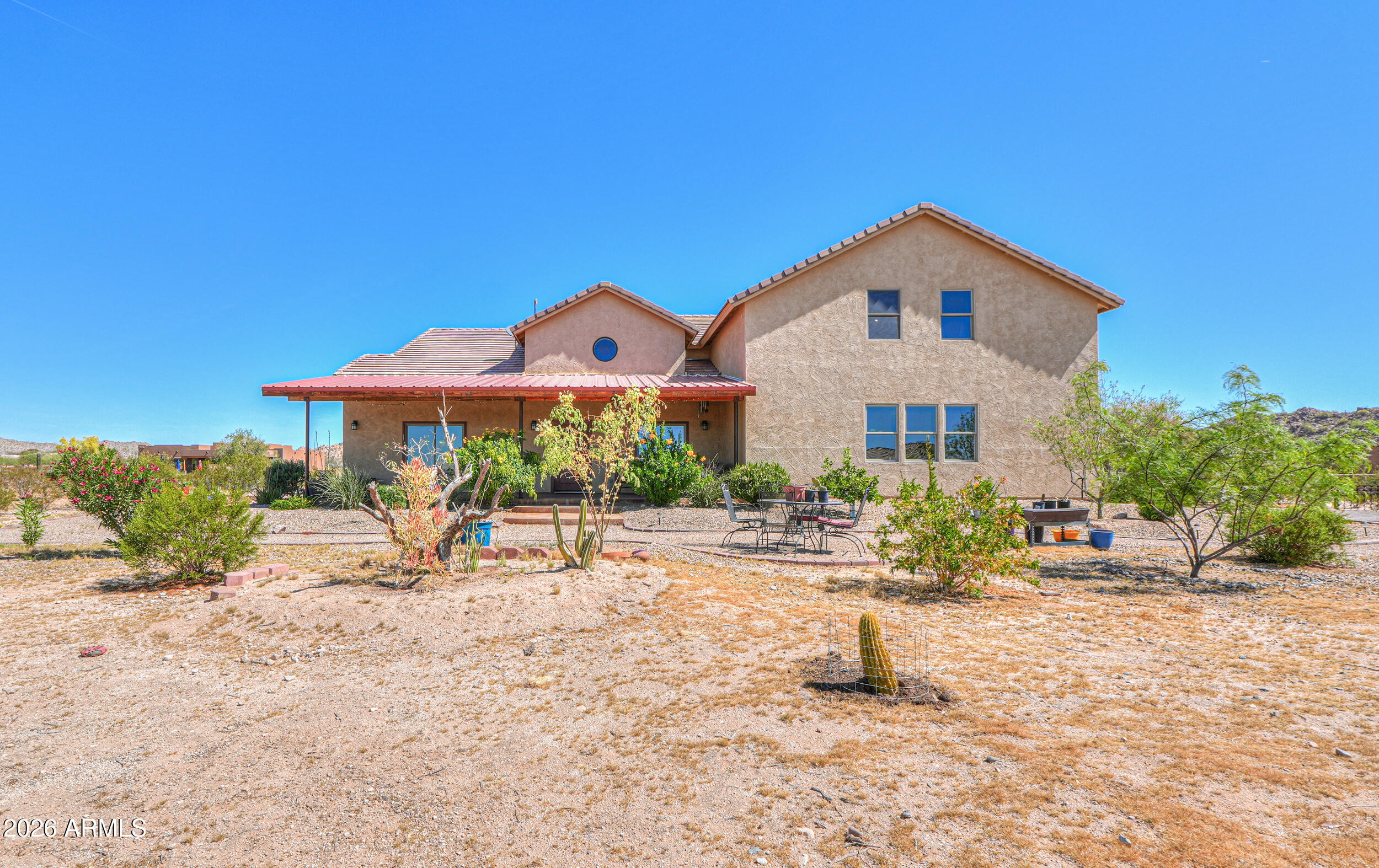 11422 North Hazeldine Road Casa Grande, AZ 85194 - Photo 2 of 59 a front view of a house with a yard