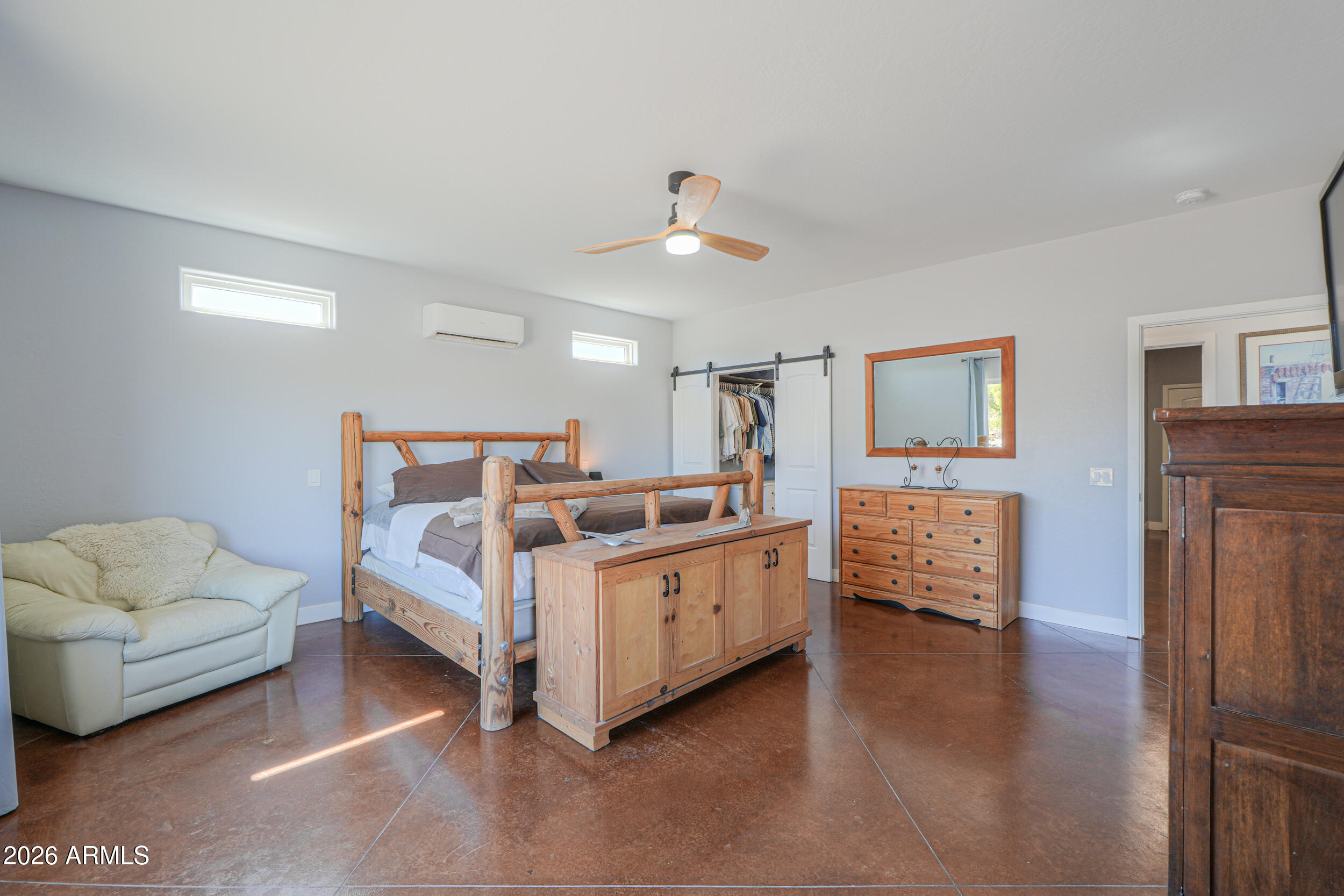 11422 North Hazeldine Road Casa Grande, AZ 85194 - Photo 28 of 59 a bed room with furniture and a couch