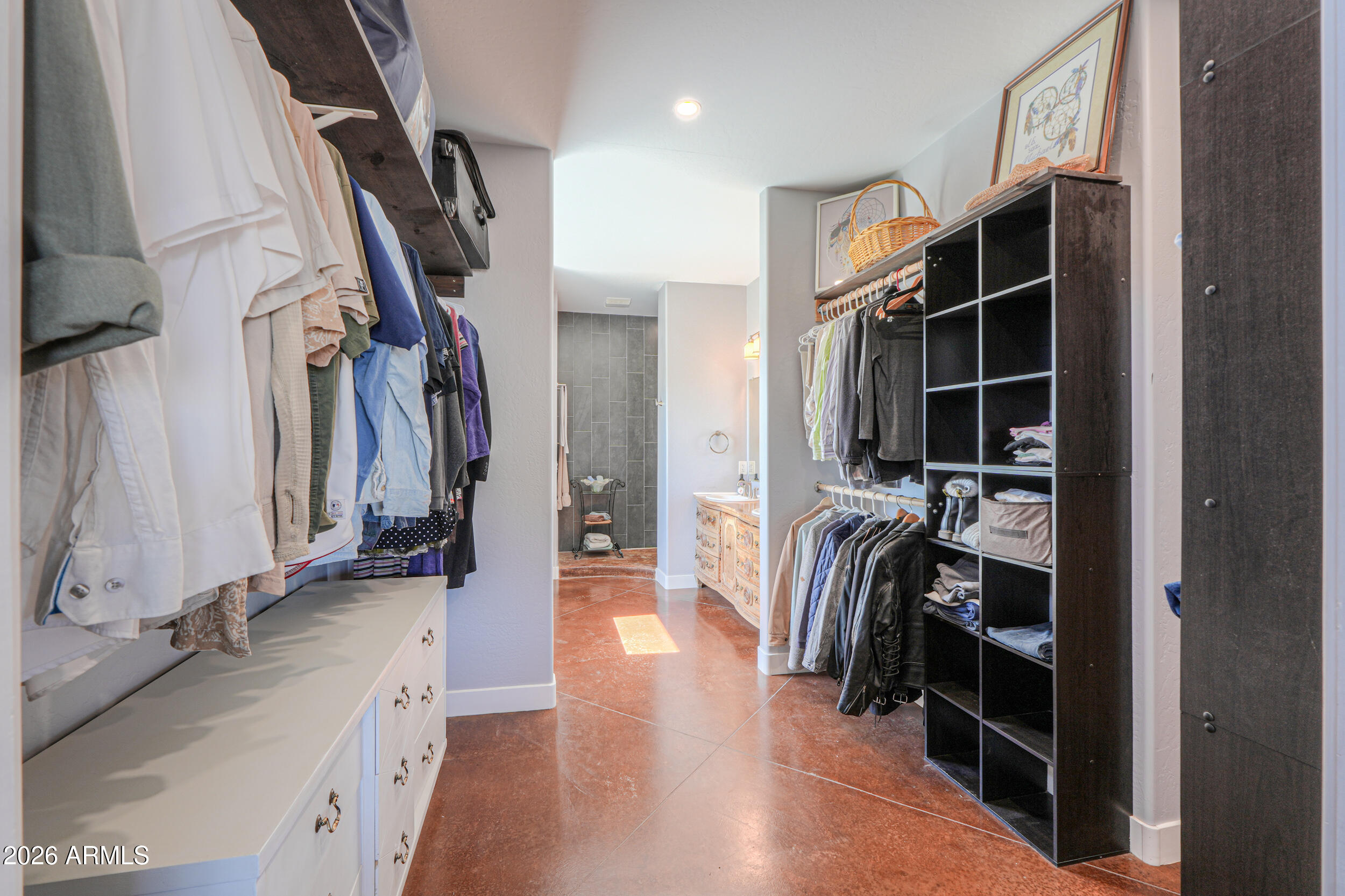 11422 North Hazeldine Road Casa Grande, AZ 85194 - Photo 29 of 59 a view of walk in closet with clothes and shoes