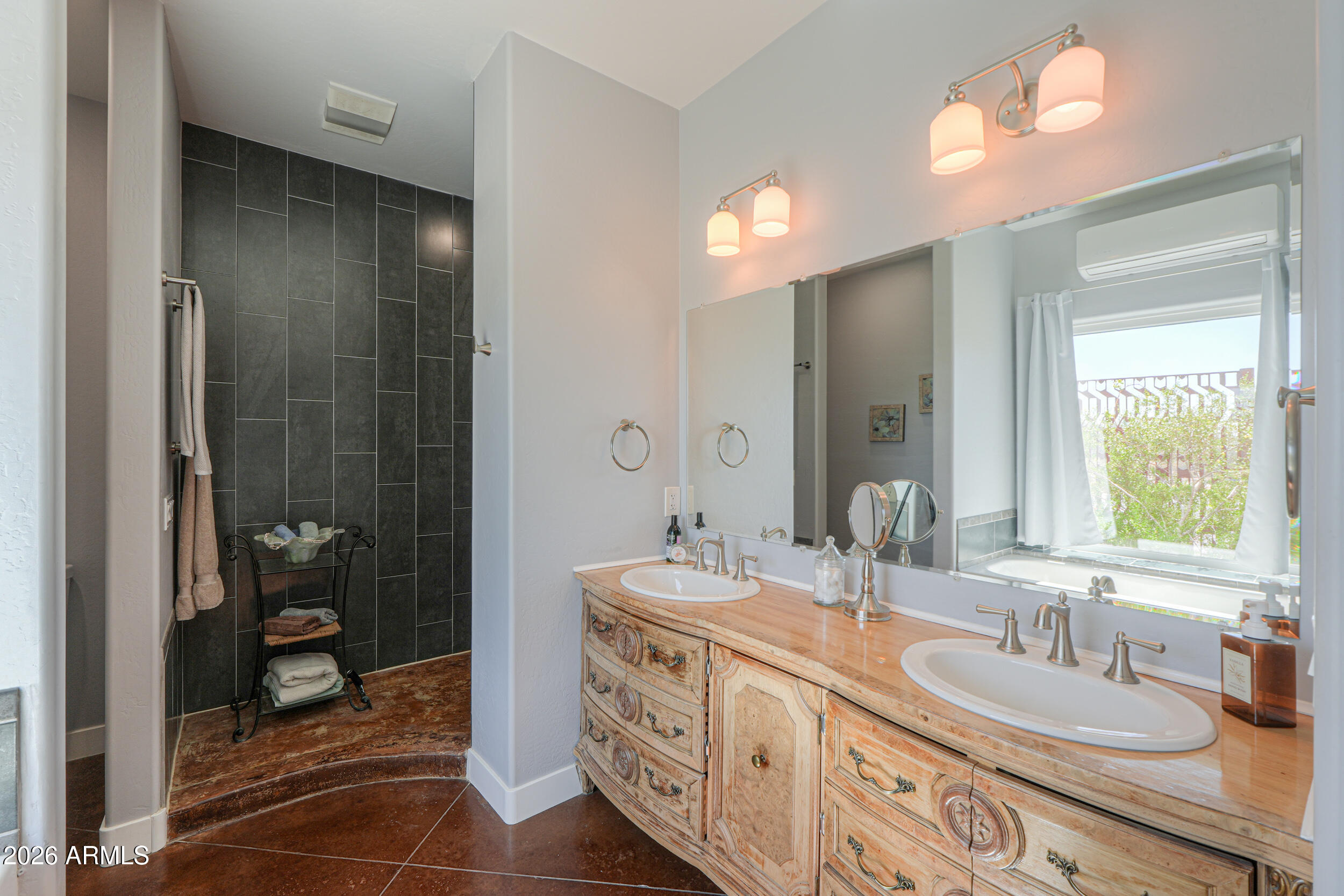 11422 North Hazeldine Road Casa Grande, AZ 85194 - Photo 31 of 59 a bathroom with double vanity and a mirror