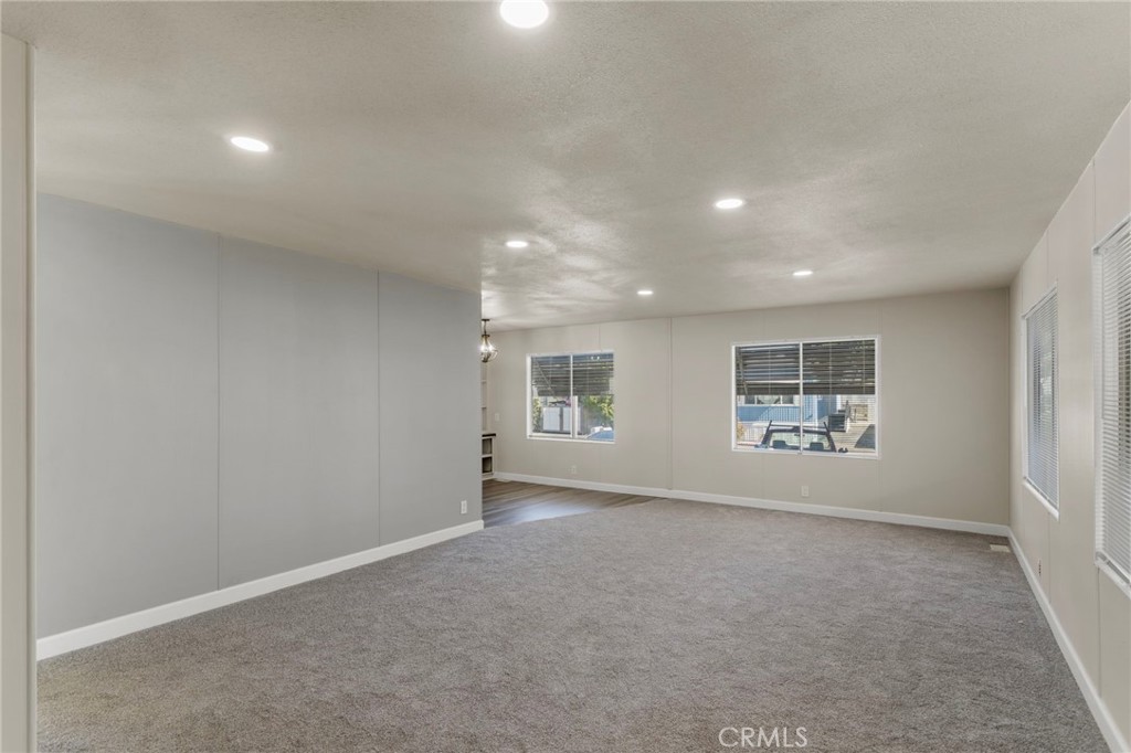 1001 West Lambert Road, Unit 179 La Habra, CA 90631 - Photo 15 of 27 an empty room with windows