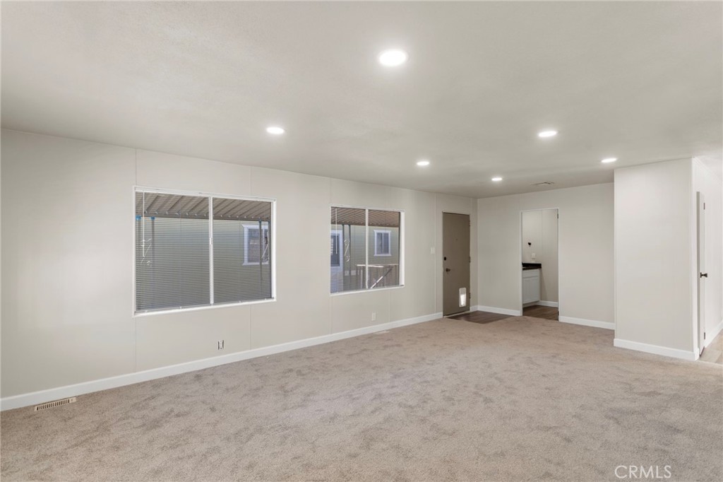 1001 West Lambert Road, Unit 179 La Habra, CA 90631 - Photo 18 of 27 a view of an empty room with a window