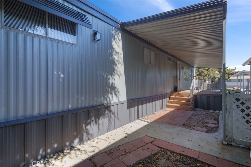 1001 West Lambert Road, Unit 179 La Habra, CA 90631 - Photo 24 of 27 a backyard of a house with outdoor seating