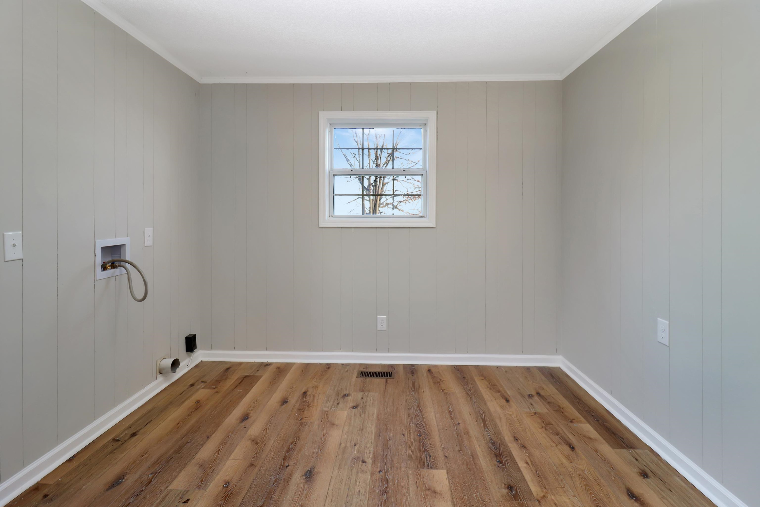 1810 OLd State Rte 76 McKenzie, TN 38201 - Photo 20 of 23 a view of a room with wooden floor and natural light