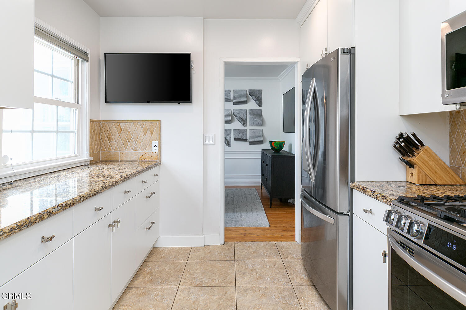 Undisclosed Address Altadena, CA 91001 - Photo 13 of 47 a kitchen with stainless steel appliances granite countertop a refrigerator and a stove top oven