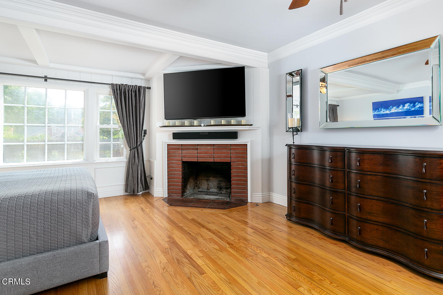 Undisclosed Address Altadena, CA 91001 - Photo 16 of 47 a living room with furniture flat screen tv and a fireplace