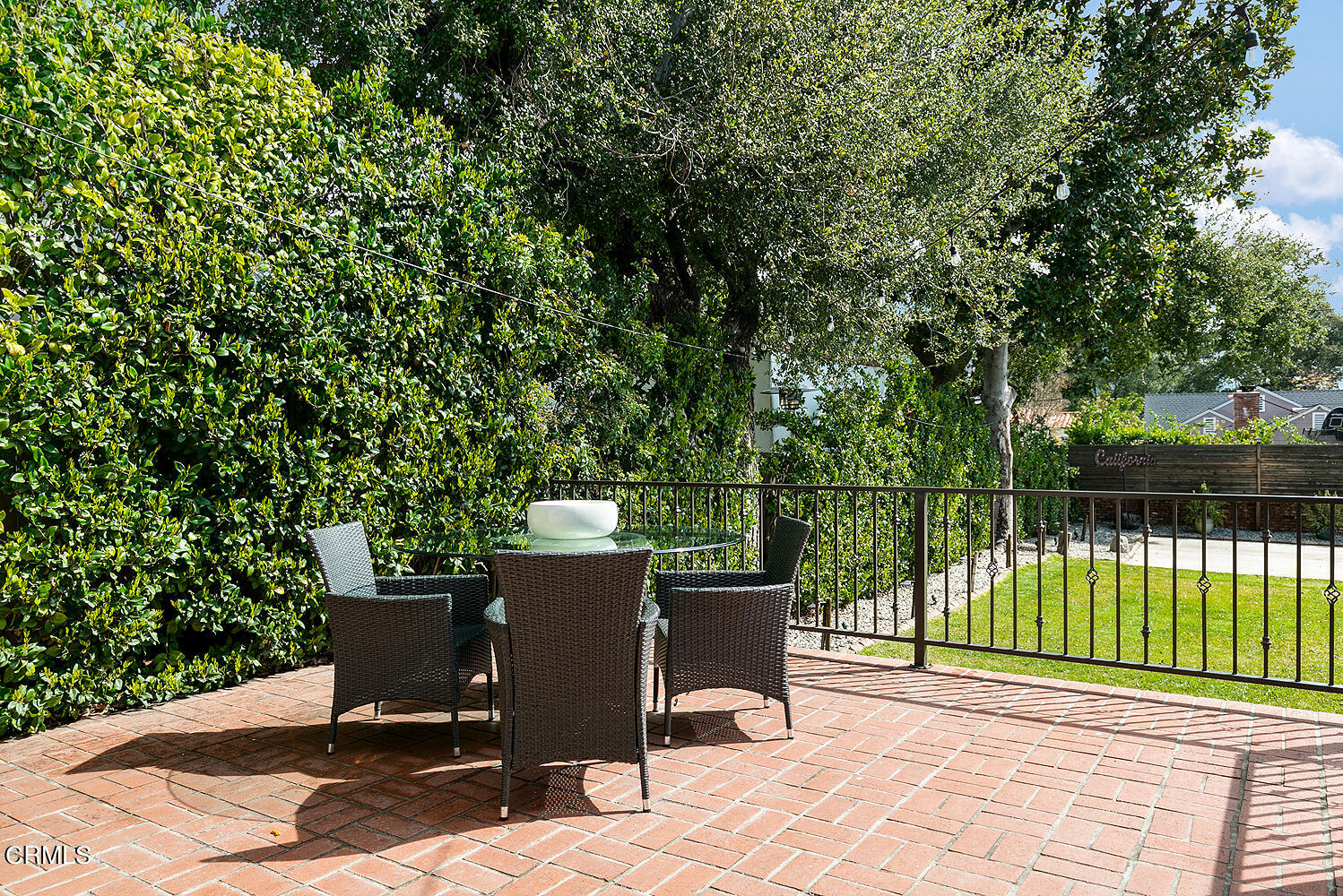 Undisclosed Address Altadena, CA 91001 - Photo 27 of 47 a view of a terrace with a table and chairs