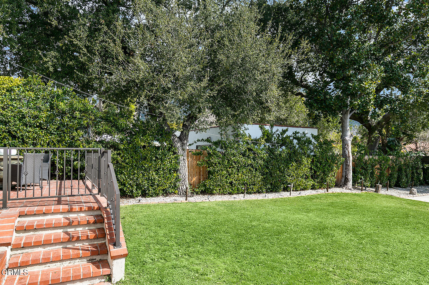 Undisclosed Address Altadena, CA 91001 - Photo 28 of 47 a view of a backyard with large trees