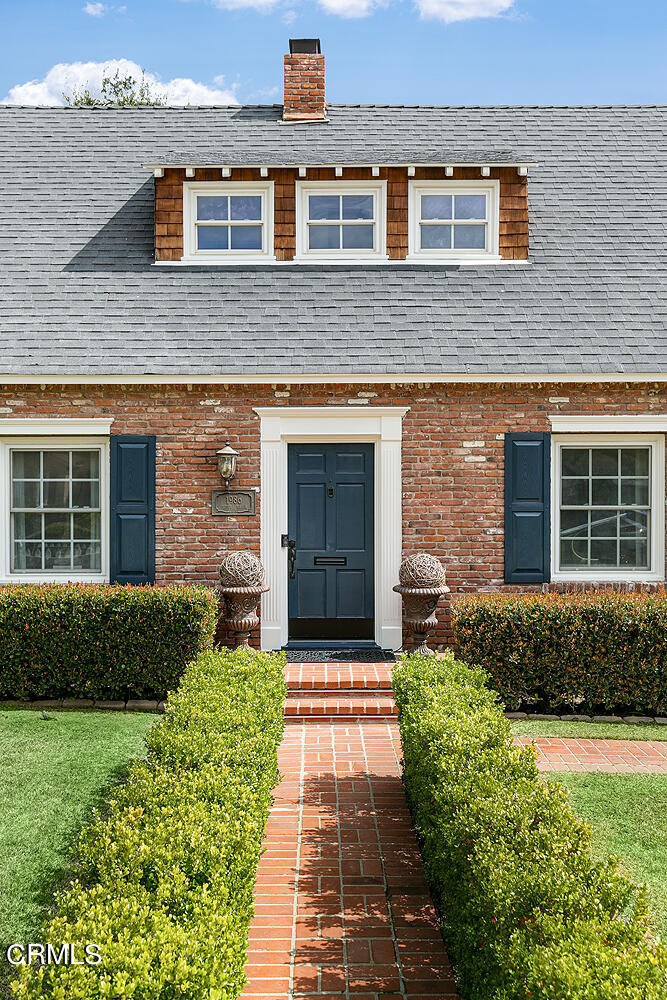 Undisclosed Address Altadena, CA 91001 - Photo 3 of 47 a front view of a house with garden