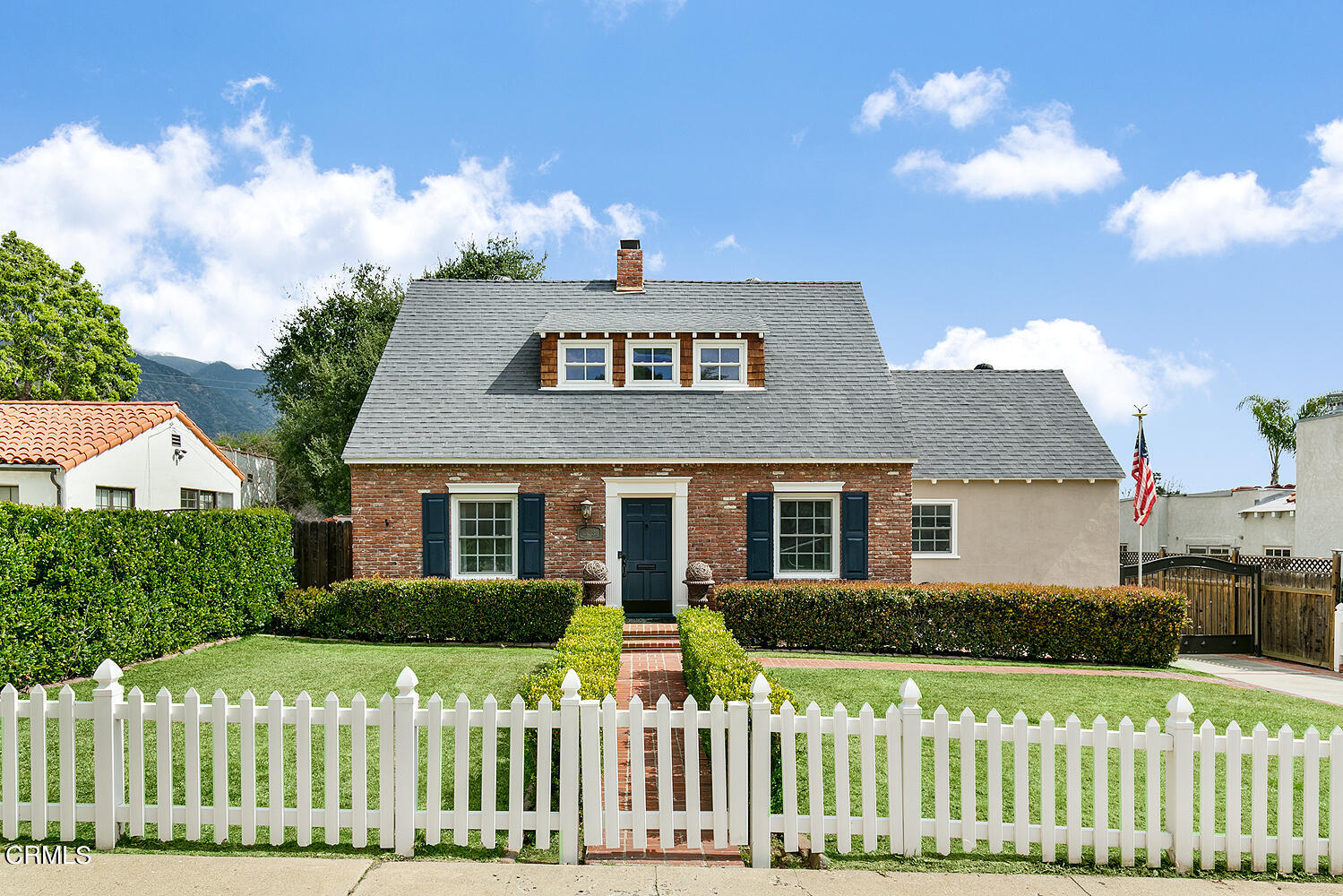 Undisclosed Address Altadena, CA 91001 - Photo 44 of 47 a front view of a house with a garden