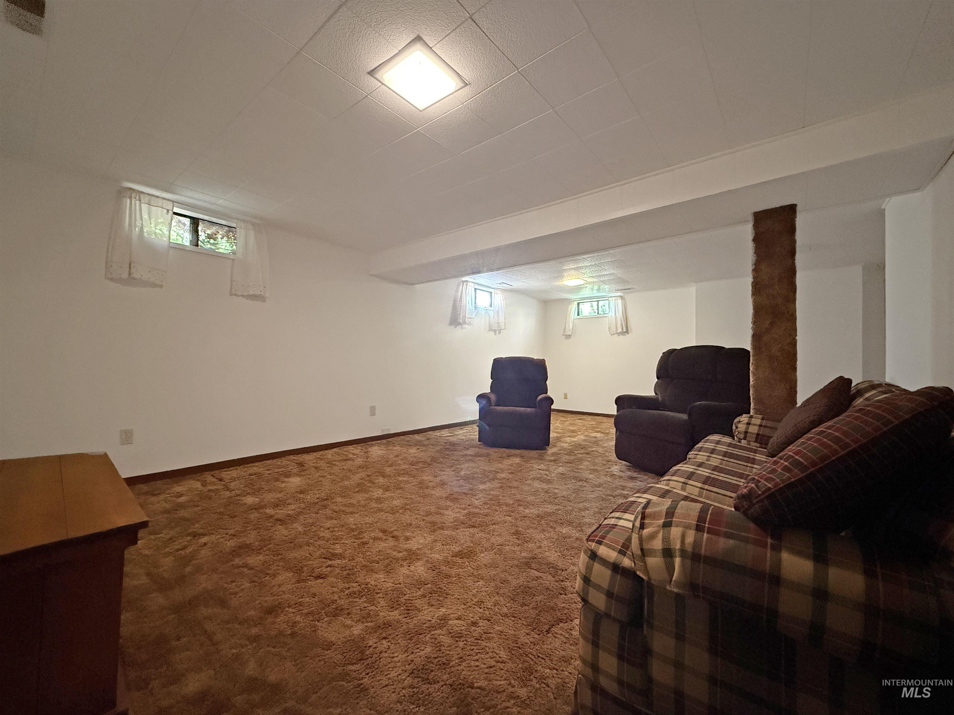 504 South Hayes Street Moscow, ID 83843 - Photo 34 of 44 Living room with carpet and plenty of natural light