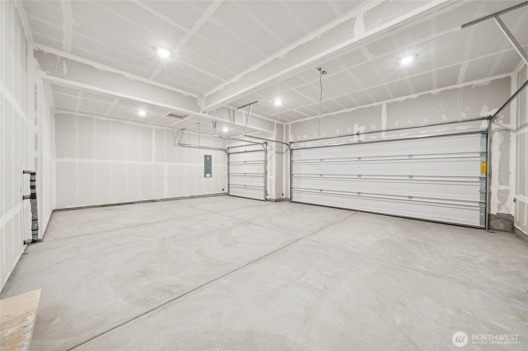 545 Wall Street, Unit 50 Buckley, WA 98321 - Photo 8 of 39 a view of an empty garage