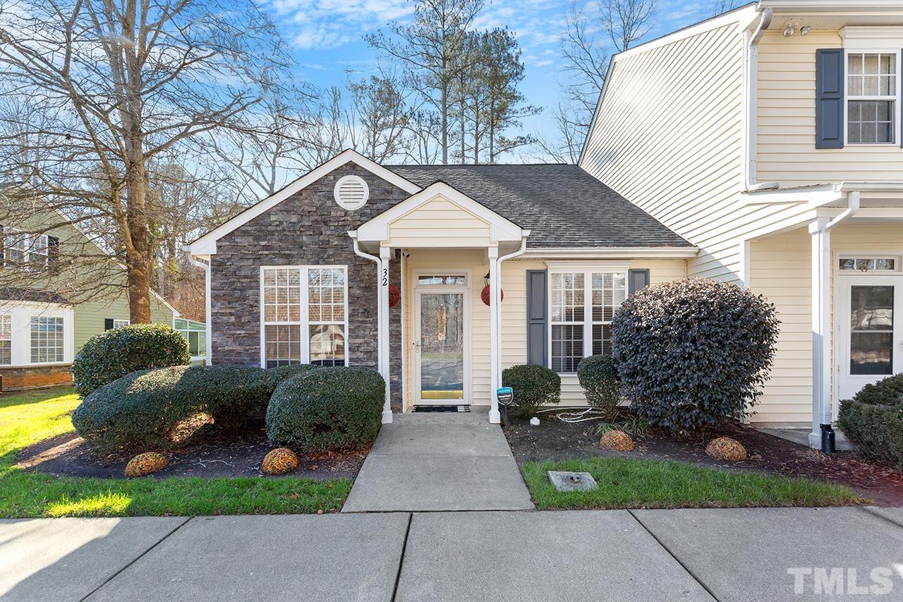 844 Horton Road, Unit 32 Durham, NC 27704 - Photo 1 of 17 a front view of a house with garden