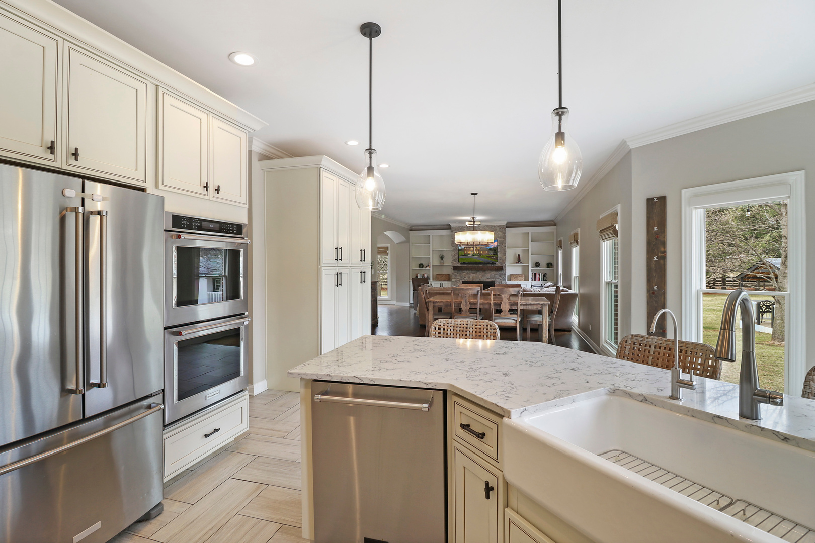206 Spring Creek Road Barrington Hills, IL 60010 - Photo 12 of 56 a kitchen with stainless steel appliances granite countertop a refrigerator a oven and white cabinets with granite countertops