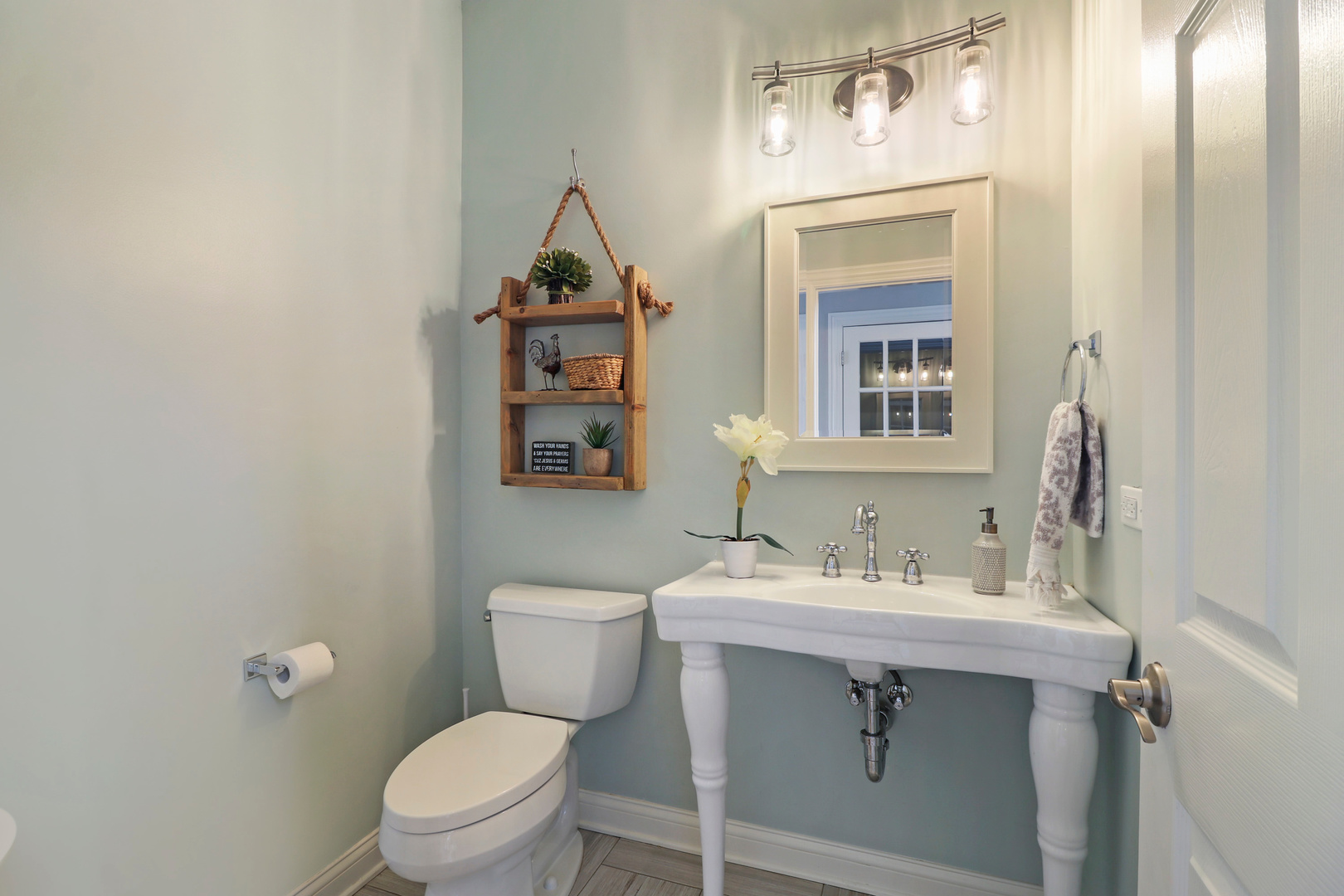 206 Spring Creek Road Barrington Hills, IL 60010 - Photo 14 of 56 a bathroom with a sink toilet and mirror