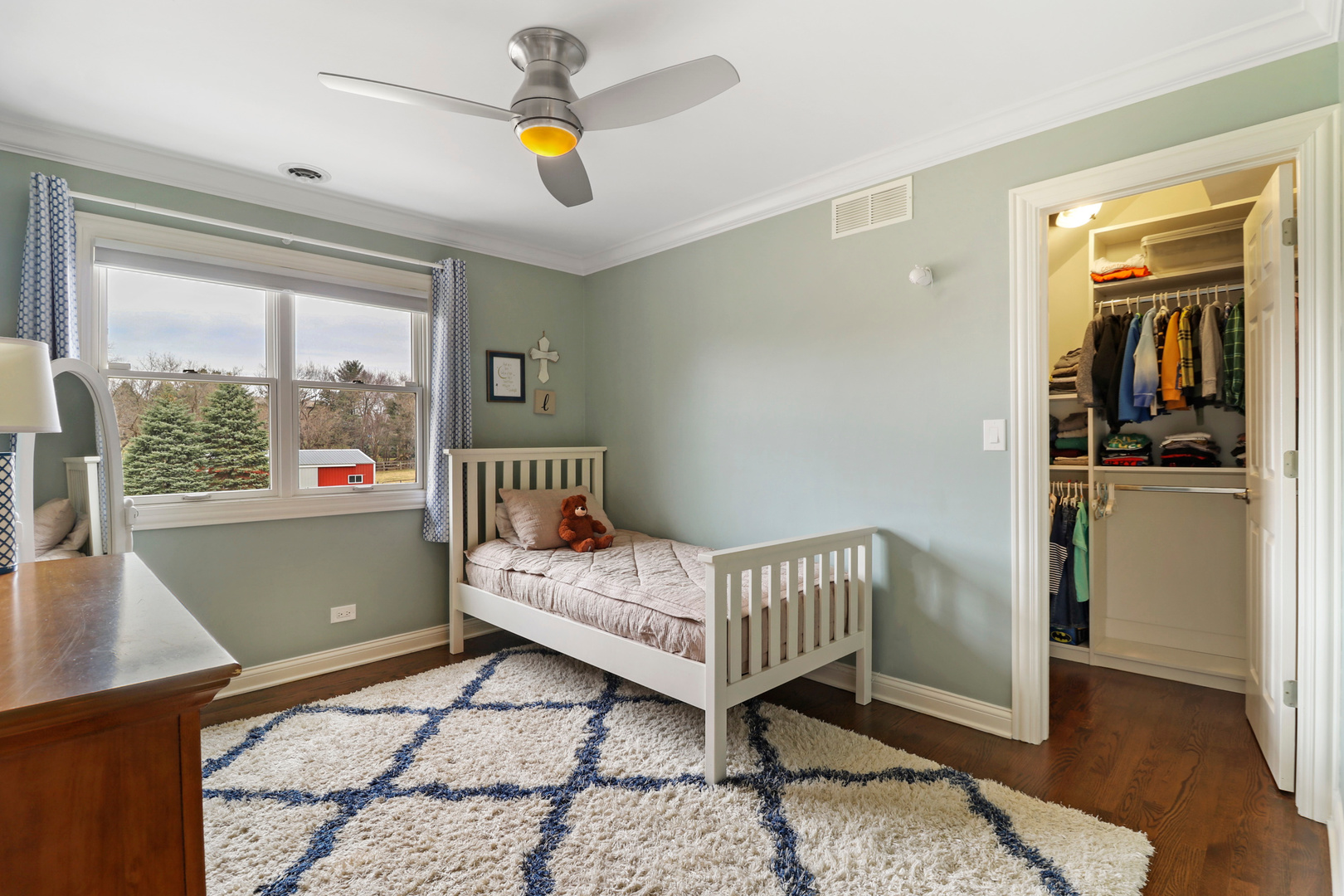206 Spring Creek Road Barrington Hills, IL 60010 - Photo 24 of 56 a bedroom with a bed and a window