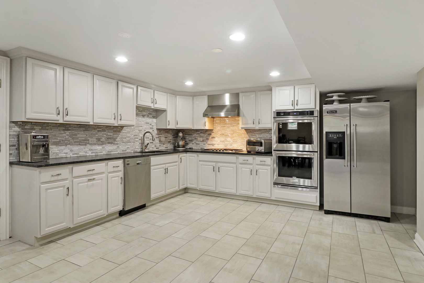 206 Spring Creek Road Barrington Hills, IL 60010 - Photo 30 of 56 a kitchen with granite countertop cabinets and steel stainless steel appliances