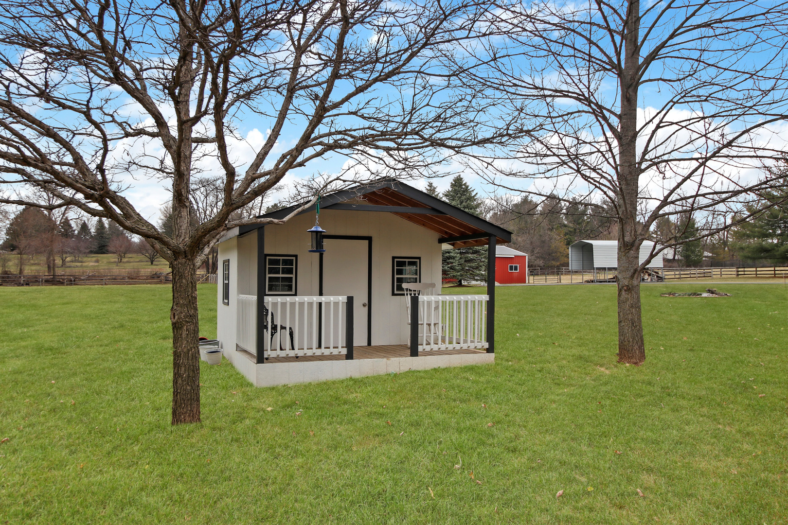206 Spring Creek Road Barrington Hills, IL 60010 - Photo 46 of 56 a view of a house with a yard