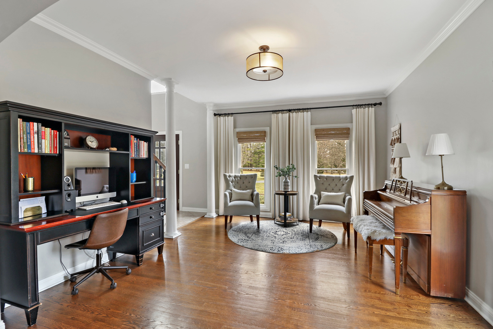 206 Spring Creek Road Barrington Hills, IL 60010 - Photo 7 of 56 a living room with furniture and a large window