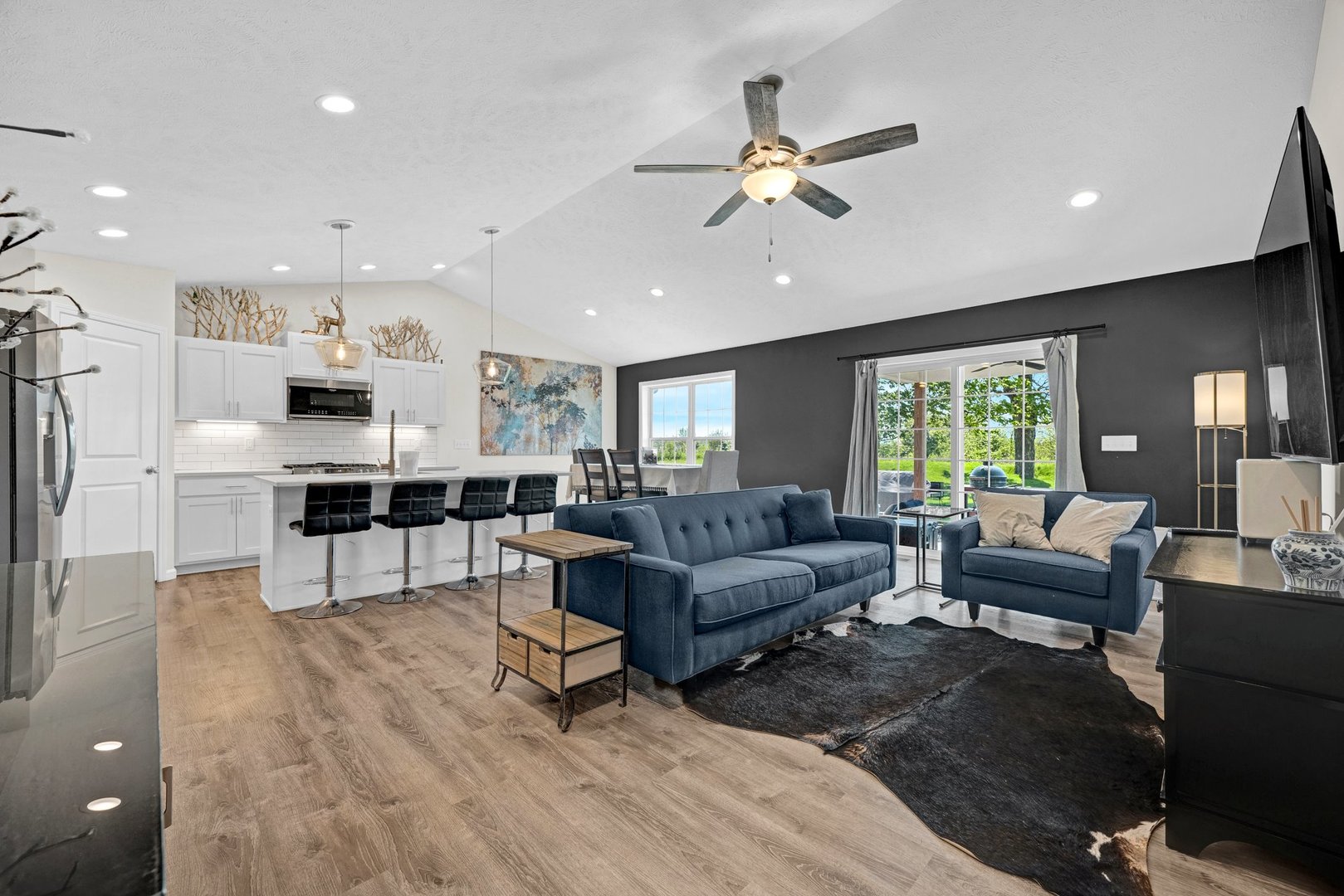 277 Cassidy Road Normal, IL 61761 - Photo 5 of 42 a living room with furniture and kitchen view