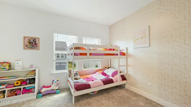 a bathroom with a sink and a shower curtain