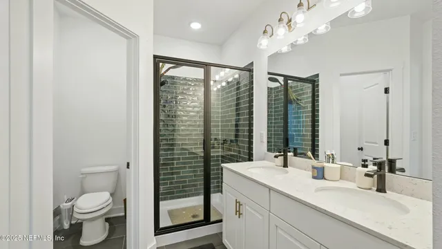 a view of a workspace with furniture and wooden floor