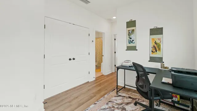 a workspace with furniture and window