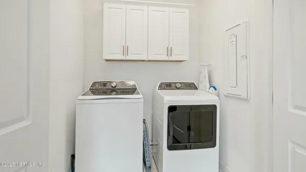 a view of storage and utility room