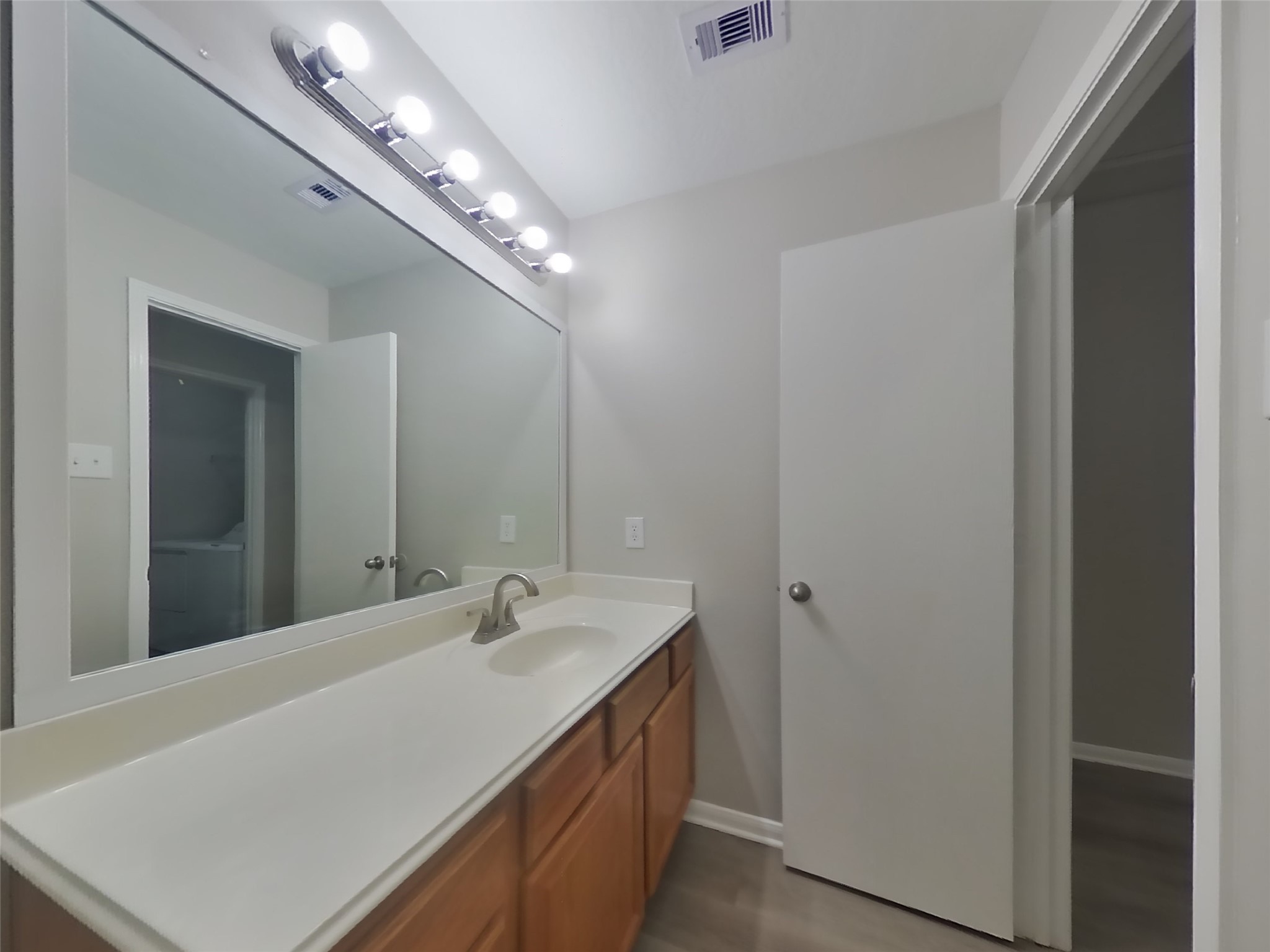 1318 Auburn View Lane Fresno, TX 77545 - Photo 14 of 18 a bathroom with a sink and a mirror
