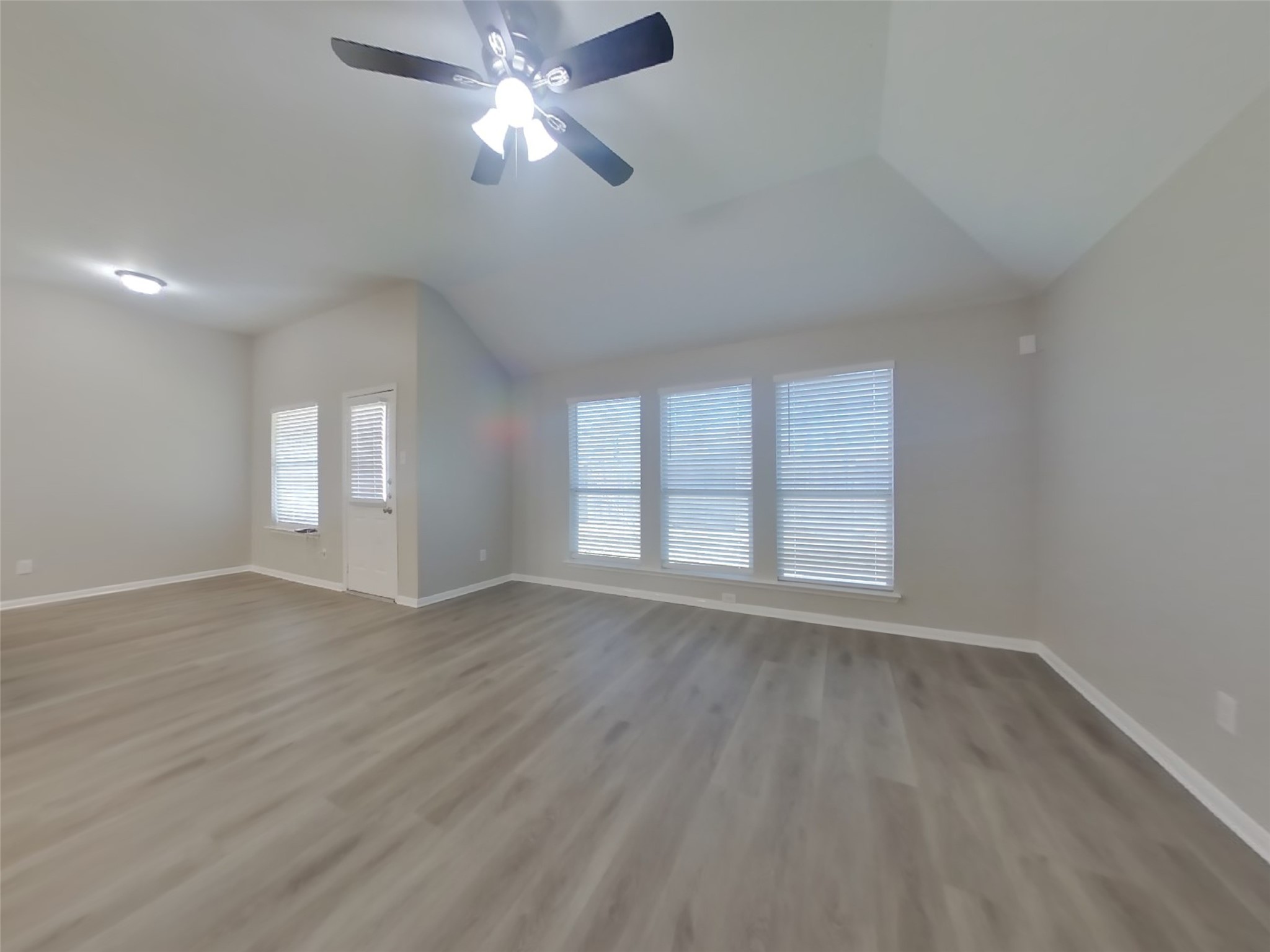 1318 Auburn View Lane Fresno, TX 77545 - Photo 3 of 18 a view of empty room with wooden floor and fan