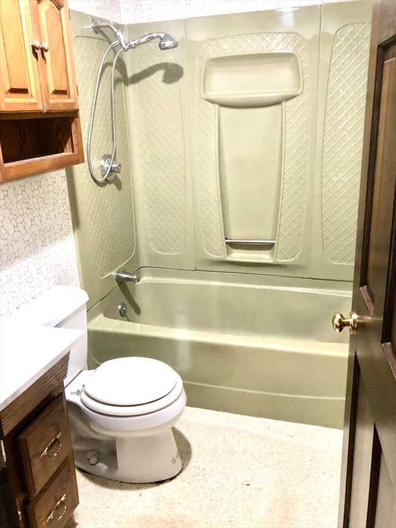 175 Maple Street Scituate, MA 02066 - Photo 5 of 9 a bathroom with a toilet and a shower