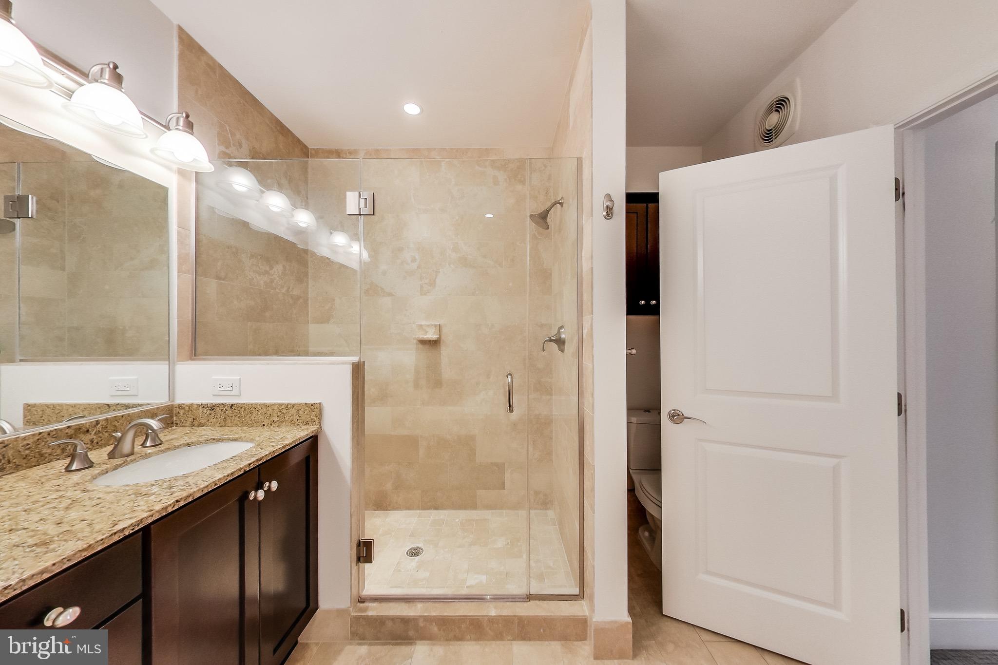 1418 North Rhodes Street, Unit B120 Arlington, VA 22209 - Photo 16 of 23 PRIMARY BATHROOM