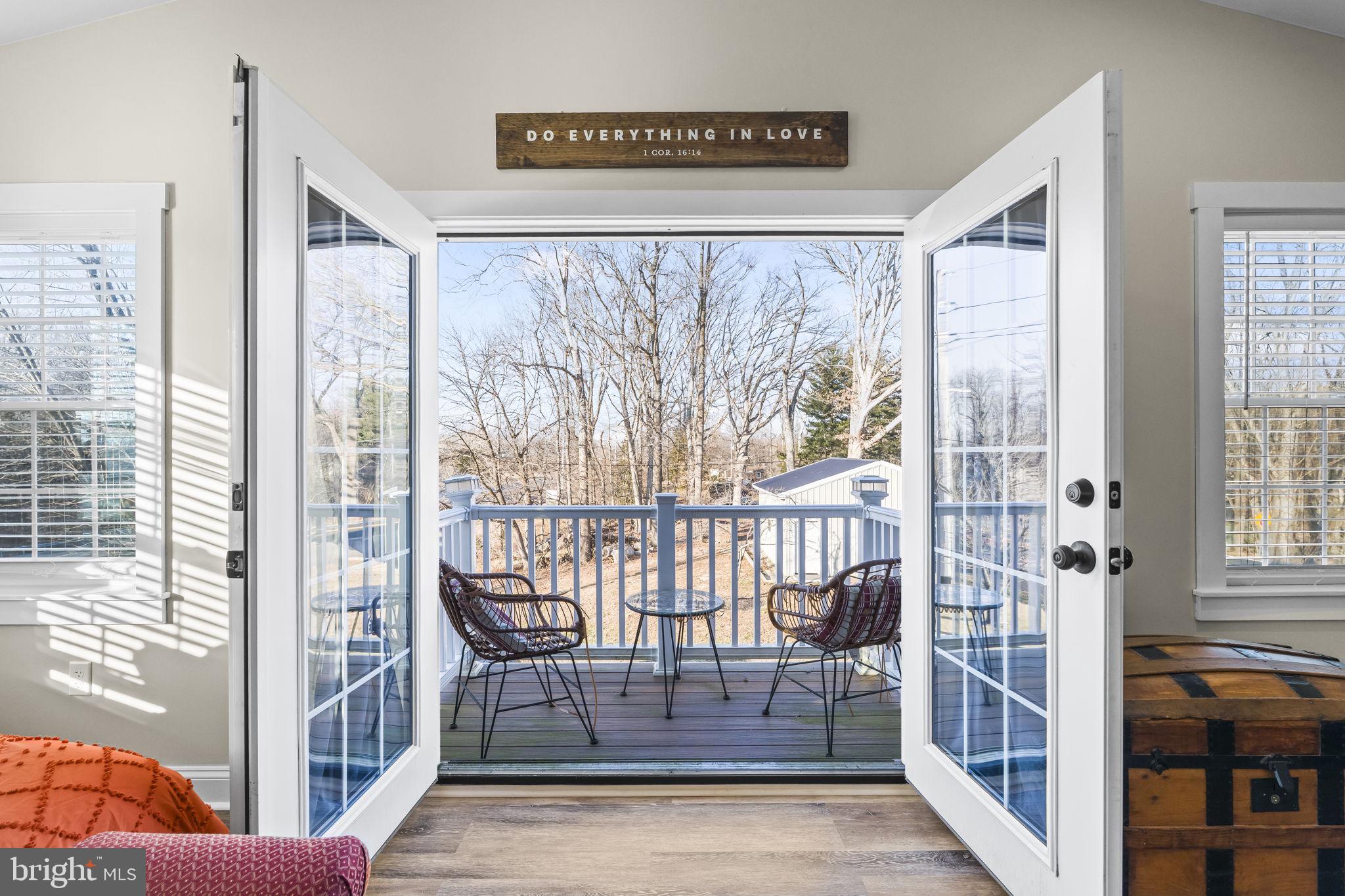 5920 Cherry Hill Road Huntingtown, MD 20639 - Photo 19 of 37 a view of a balcony with furniture
