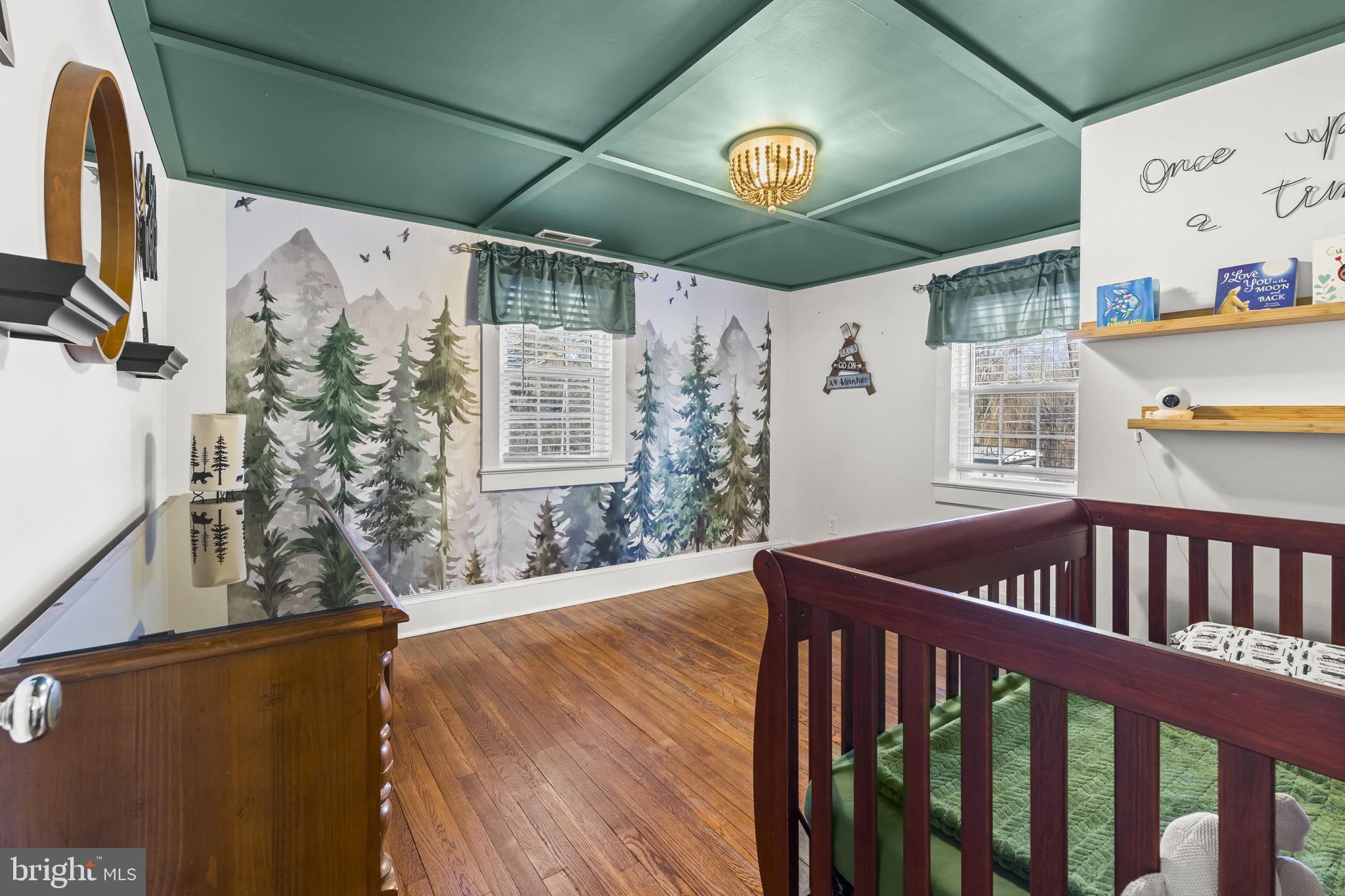 5920 Cherry Hill Road Huntingtown, MD 20639 - Photo 23 of 37 a bedroom with furniture and a large window