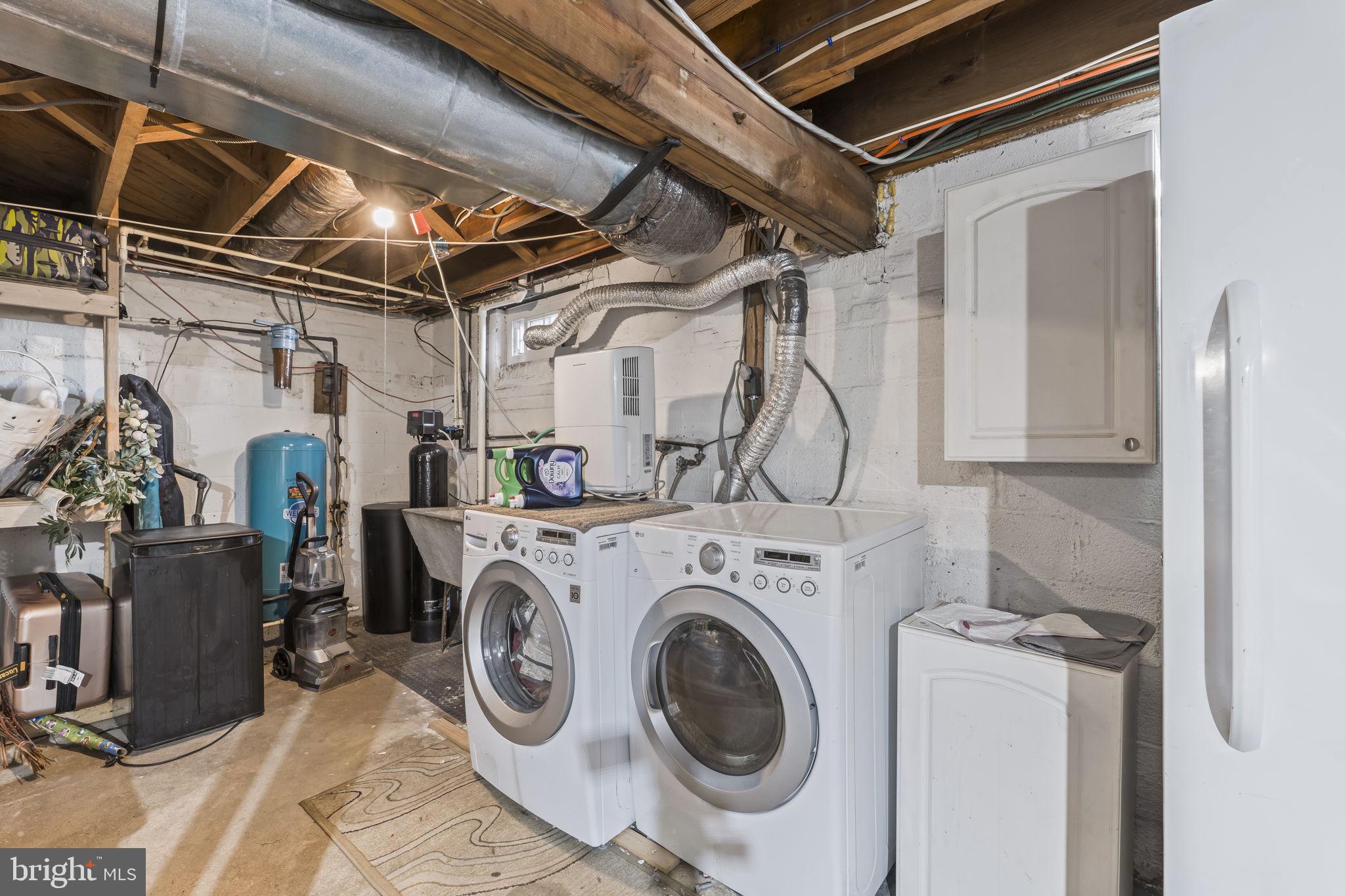 5920 Cherry Hill Road Huntingtown, MD 20639 - Photo 26 of 37 a utility room with dryer and washer