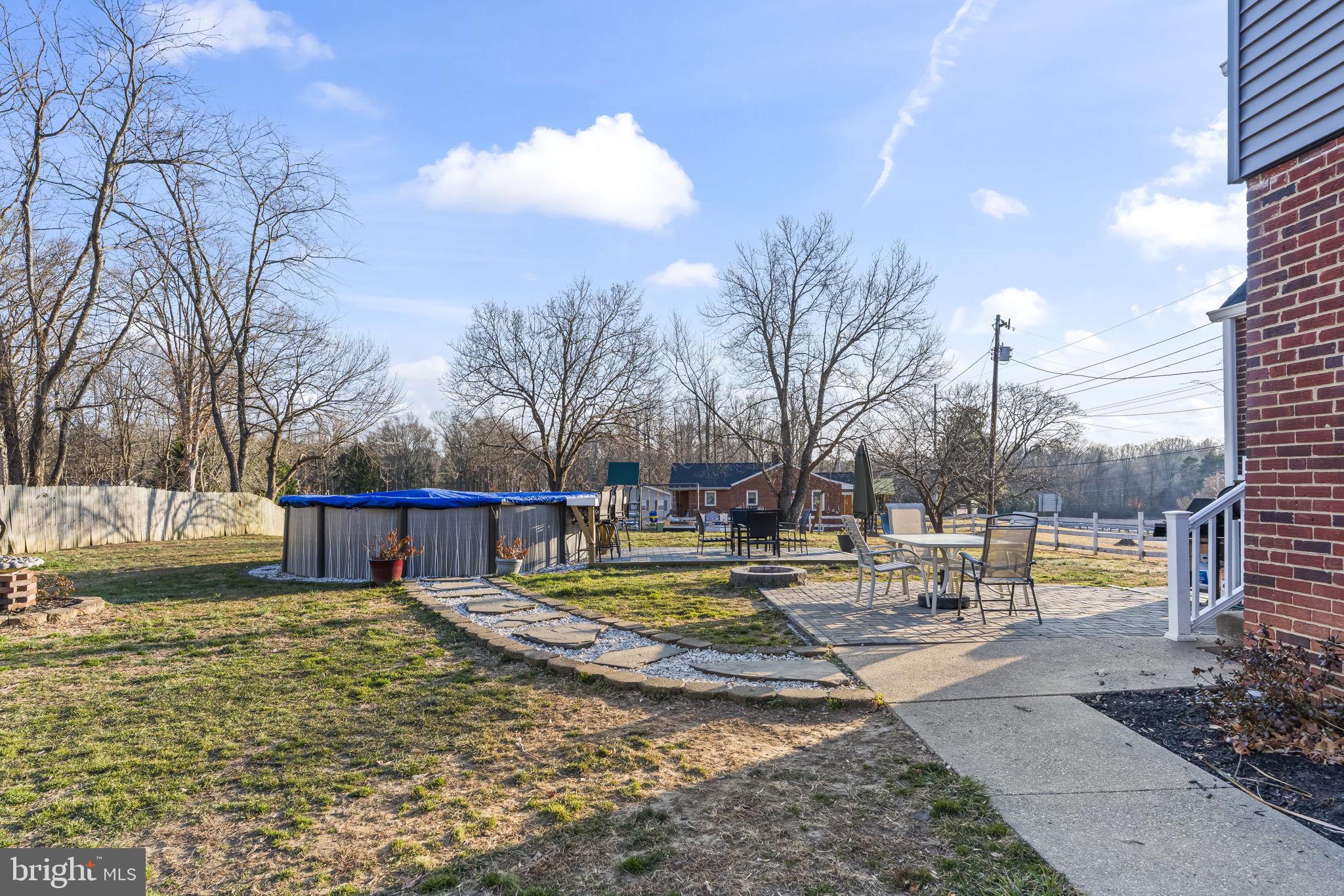 5920 Cherry Hill Road Huntingtown, MD 20639 - Photo 32 of 37 a view of residential houses with snow on the road