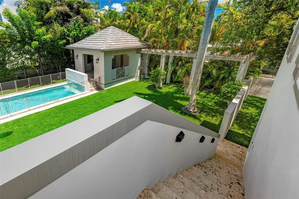 a view of a backyard with a garden