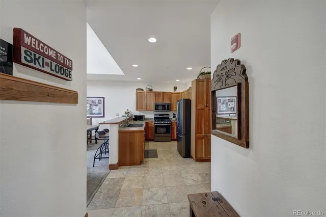a view of a kitchen with furniture and garage