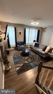 a bedroom with bed and a flat screen tv