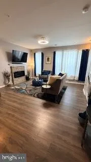 a view of kitchen and a stove
