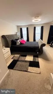 a living room with a couch and a table