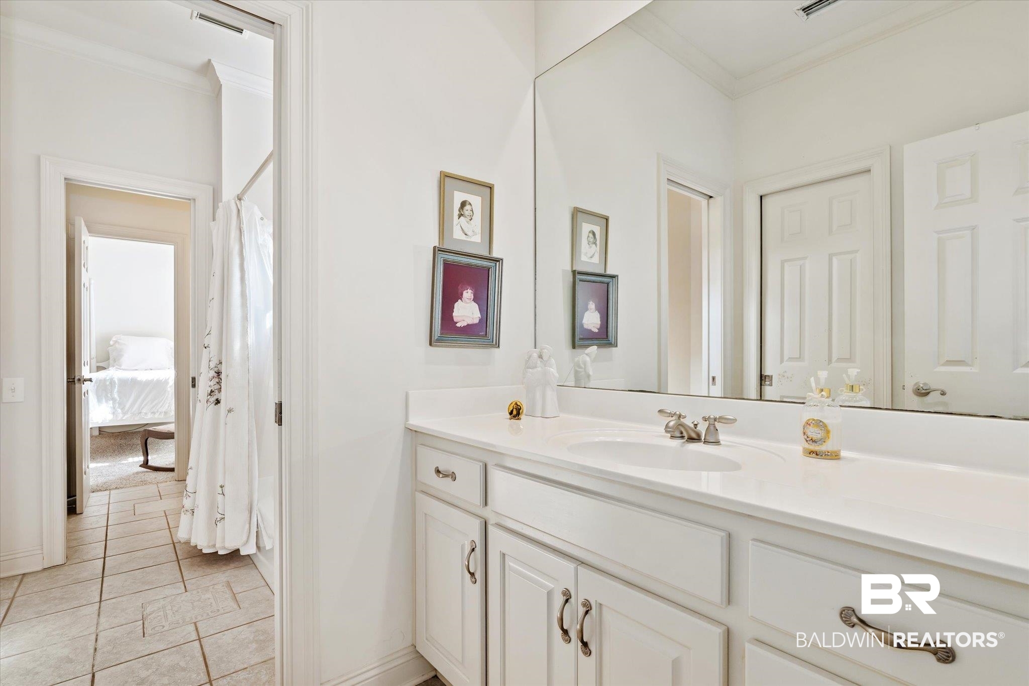 3963 Wimbledon Park Mobile, AL 36608 - Photo 42 of 51 Bathroom with crown molding, tile patterned floors, and vanity