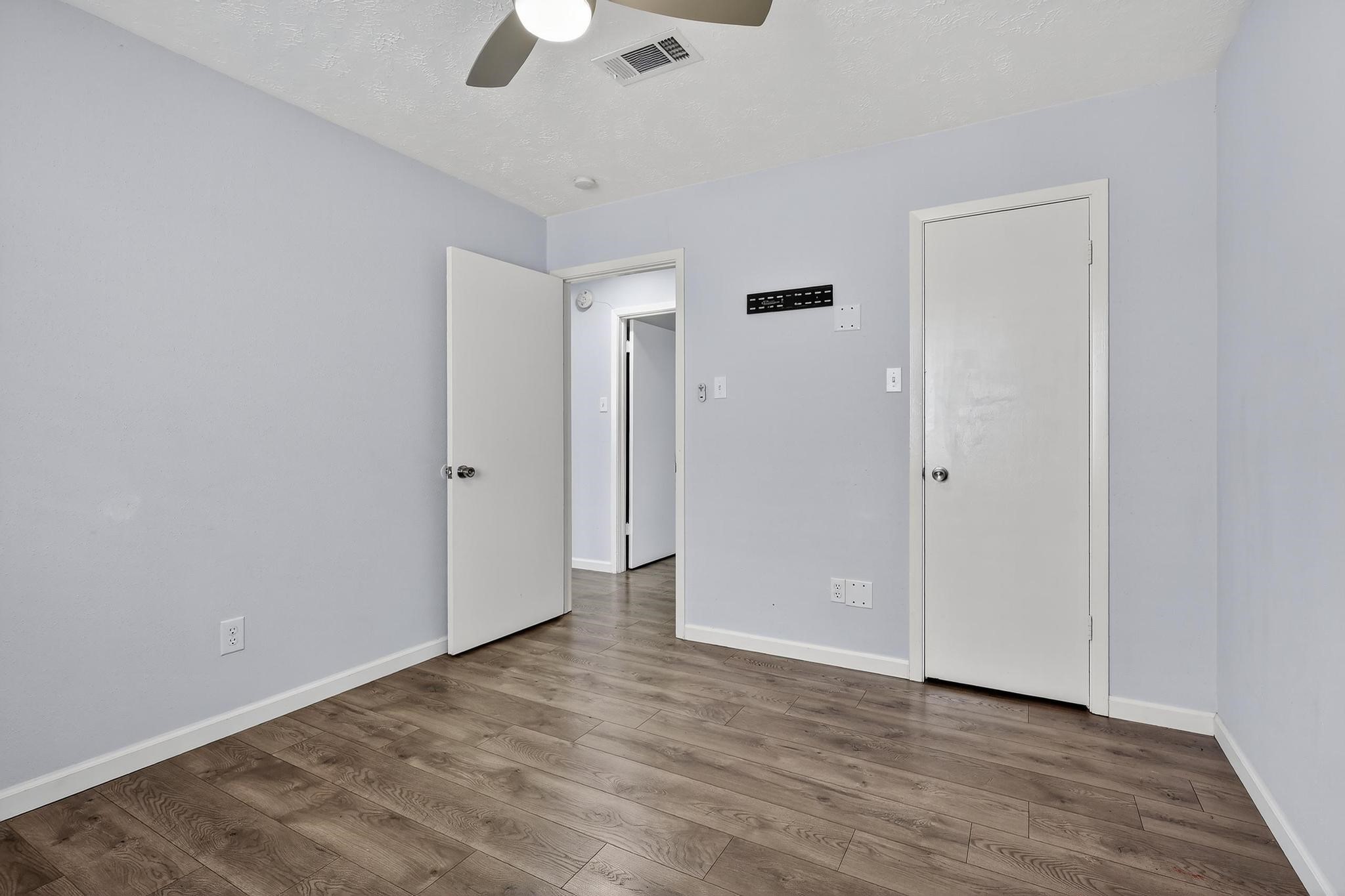 7331 Misty Morning Drive Humble, TX 77346 - Photo 15 of 19 wooden floor in an empty room