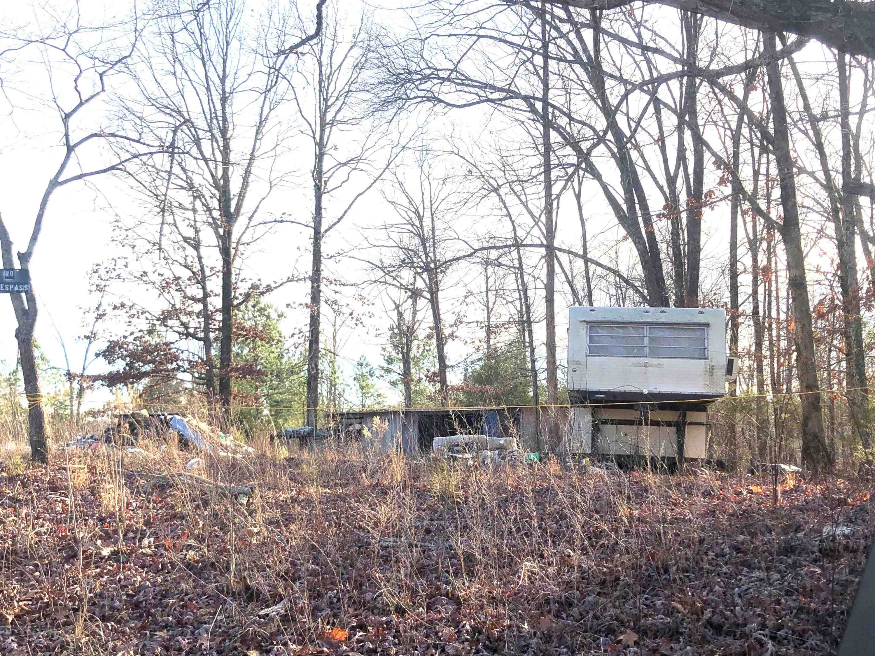 901 Joe Tillman Road Decaturville, TN 38329 - Photo 4 of 7 a backyard of a house with lots of green space